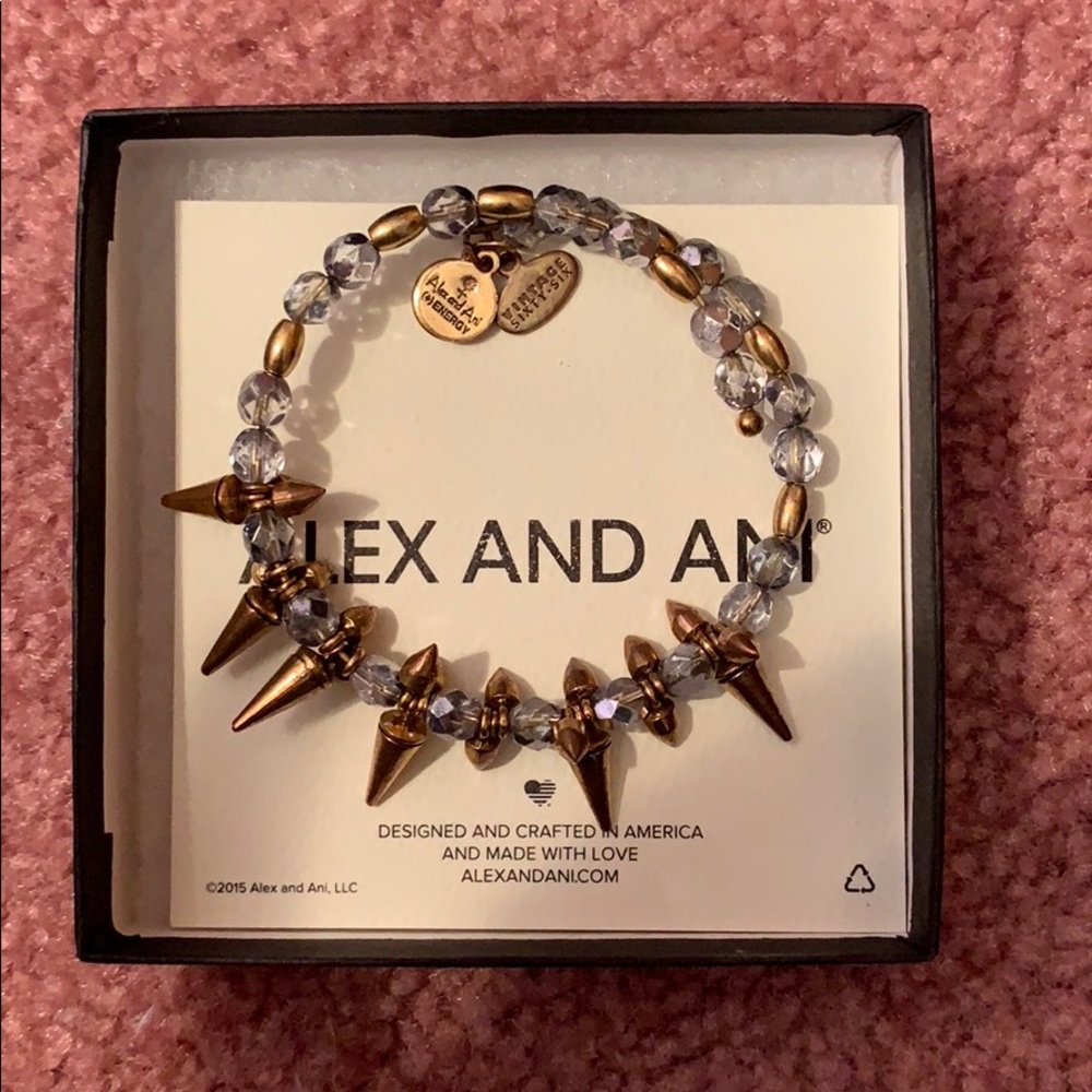 Alex and Ani spike bracelet in gold and purple